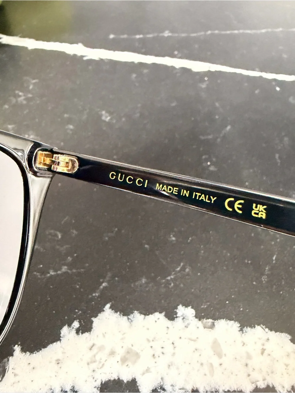 Gucci Black Frame Sunglasses with Gradient Purple Lenses